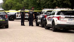 Police are shown at the scene of a shooting investigation in Vaughan on June 21. Four people were found in a home with gunshot wounds. (CP24)