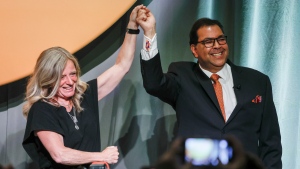 Former Alberta NDP leader Rachel Notley, left, congratulates Naheed Nenshi after he was named as the new leader of the Alberta NDP in Calgary, Saturday, June 22, 2024.THE CANADIAN PRESS/Jeff McIntosh