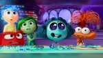 This image released by Disney/Pixar shows, from left, Joy, voiced by Amy Poehler, background left, Anger, voiced by Lewis Black, Disgust, voiced by Liza Lapira, Envy, voiced by Ayo Edebiri, and Anxiety, voiced by Maya Hawke, in a scene from "Inside Out 2." (Disney/Pixar via AP)