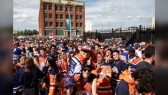 Edmonton Oilers fans line up to watch the game in Edmonton on Monday, June 24, 2024. The Oilers are taking on the Florida Panthers in Game 7 of the NHL Stanley Cup final. THE CANADIAN PRESS/Jason Franson