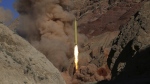 A Qadr H long-range ballistic surface-to-surface missile is fired by Iran's powerful Revolutionary Guard during a maneuver in an undisclosed location in Iran, on March 9, 2016. (Omid Vahabzadeh / The Associated Press) 