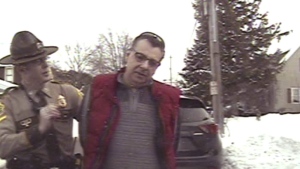 This image taken from police dashcam video shows Gregory Bombard getting arrested on Feb. 9, 2018 n St. Albans, Vt. (American Civil Liberties Union/Vt. State Police via AP)