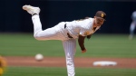 San Diego Padres starting pitcher Dylan Cease works against a Washington Nationals batter during the first inning of a baseball game Wednesday, June 26, 2024, in San Diego. (AP Photo/Gregory Bull)