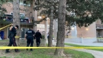 Police are pictured at an apartment complex on Cherokee Boulevard following a shooting Thursday June 27, 2024. (Courtney Heels /CP24)