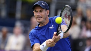 Andy Murray of Britain plays a return to Jordan Thompson of Australia during their men's singles match on day five of The Queen's Club tennis tournament, in London, Wednesday, June 19, 2024. (AP Photo/Kirsty Wigglesworth, File)