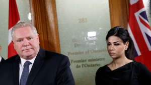 Ontario Premier Doug Ford is flanked by Goldie Ghamari in Toronto on Thursday, Jan. 16, 2020. THE CANADIAN PRESS/Cole Burston
