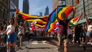 The Toronto Pride Parade will wind through the streets of the Ontario capital, with thousands expected to attend. Participants run with a multinations pride flag during the Toronto Pride Parade, Sunday, June 25, 2023. THE CANADIAN PRESS/Chris Young
Chris Young