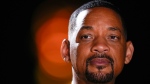 Actor Will Smith poses during a photo shoot to promote his latest film, "Bad Boys: Ride or Die", in Mexico City, Friday, May 31, 2024. (AP Photo/Matias Delacroix)