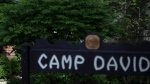 In this May 14, 2015, file photo, Camp David, Md. is seen. (AP Photo/Andrew Harnik, File)