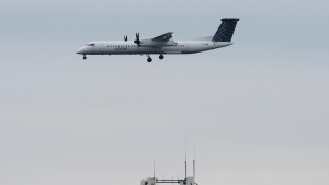 A Porter airplane lands in Toronto on Wednesday, March 18, 2020. (The Canadian Press/Nathan Denette)