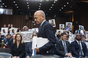 With protesters in the audience, Boeing CEO Dave Calhoun arrives to testify before a Senate subcommittee to answer to lawmakers about troubles at the aircraft manufacturer. (AP Photo/J. Scott Applewhite, File)
