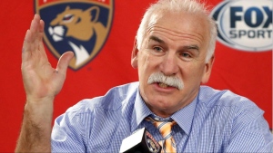 Florida Panthers head coach and former Chicago Blackhawks coach Joel Quenneville responds to a question during his first visit back to Chicago as a head coach before an NHL hockey game between the Blackhawks and the Panthers, Jan. 21, 2020. The NHL has reinstated executives Stan Bowman and Al MacIsaac and coach Quenneville. (AP Photo/Charles Rex Arbogast, File)
