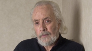 FILE - Screenwriter Robert Towne poses at The Regency Hotel, March 7, 2006, in New York. Towne, the Oscar-winning screenplay writer of "Shampoo," "The Last Detail" and other acclaimed films whose work on "Chinatown" became a model of the art form and helped define the jaded allure of his native Los Angeles, died Monday, July 1, 2024, surrounded by family at his home in Los Angeles, said publicist Carri McClure. (AP Photo/Jim Cooper, File)