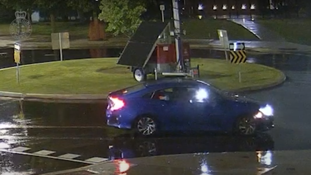 A suspect is seen opening fire on a Richmond Hill movie theatre from the back seat of a vehicle. (York Regional Police)