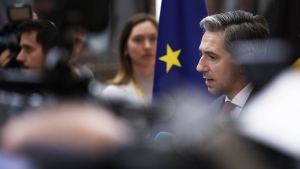 FILE - Ireland's Prime Minister Simon Harris, right, speaks with the media as he arrives for an EU summit at the European Council in Brussels, Monday, June 17, 2024. THE CANADIAN PRESS/AP-Omar Havana