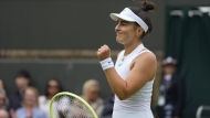 Bianca Andreescu of Canada reacts after winning a point against Linda Noskova of the Czech Republic during their match on day three at the Wimbledon tennis championships in London, Wednesday, July 3, 2024. THE CANADIAN PRESS/AP/Kirsty Wigglesworth