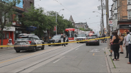 Police are on the scene of a fatal streetcar collision in Parkdale on Wednesday, July 3, 2024. (Jacob Estrin for CTV News Toronto)