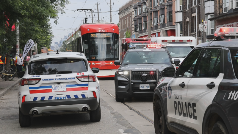 Police are on the scene of a fatal streetcar collision in Parkdale on Wednesday, July 3, 2024. (Jacob Estrin for CTV News Toronto)