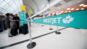 The WestJet check-in area at Pearson International Airport is photographed in Toronto, Saturday, June 29, 2024. THE CANADIAN PRESS/Christopher Katsarov