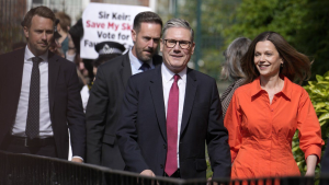 Labour Party leader Keir Starmer and wife Victoria arrive at a polling station to cast their vote in London, Thursday, July 4, 2024. (AP Photo/Vadim Ghirda)