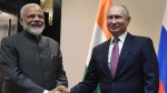 Russian President Vladimir Putin, right, and Indian Prime Minister Narendra Modi pose for a photo prior to their talks on a sideline of the Shanghai Cooperation Organization summit in Bishkek, Kyrgyzstan, June 13, 2019. (Grigory Sysoyev, Sputnik, Kremlin Pool Photo via AP, File)