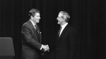 President Ronald Reagan, left, and his Democratic challenger Walter Mondale, shake hands before debating in Kansas City, Mo., Oct. 22, 1984. The age question for presidential candidates is more than four decades old. (AP Photo/Ron Edmonds, File)