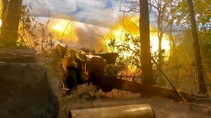 In this photo taken from video released by Russian Defense Ministry Press Service on Wednesday, July 3, 2024, Russian soldiers fire from their 152-mm howitzer from their position at Ukrainian troops at an undisclosed location in Ukraine. (Russian Defense Ministry Press Service via AP)