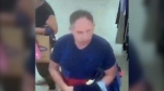 A suspect wanted in connection with a voyeurism incident at a Toronto store on June 27 is shown. (Toronto Police Service)