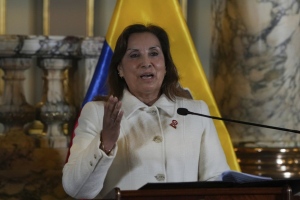 Peru's President Dina Boluarte gives a statement to the press during an official visit by Ecuadorean counterpart Daniel Noboa to the government palace in Lima, Peru, Thursday, July 4, 2024. (AP Photo/Guadalupe Pardo)