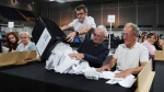 Votes are counted at Emirates Arena in Glasgow, Scotland, during the count for Glasgow Central and Glasgow South constituencies in the 2024 General Election, Thursday, July 4, 2024. (Andrew Milligan / PA via AP)