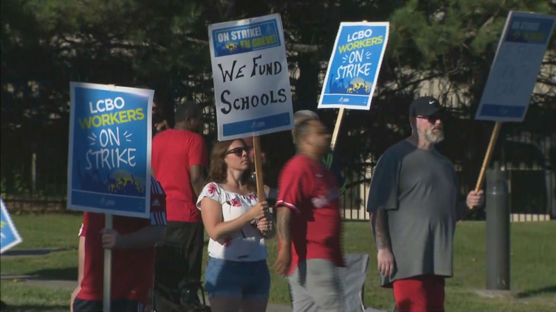 LCBO workers are shown picketing outside a distribution centre in Whitby on July 5. (CTV News Toronto)
