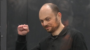 Russian opposition activist Vladimir Kara-Murza gestures while standing in a defendants' cage at the Moscow City Court in Moscow, Russia, on July 31, 2023. (AP Photo, File)
