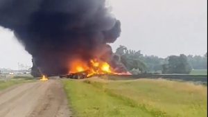This photo provided by Doug Zink, smoke fills the sky after a train derailment on Friday, July 5, 2024 near Carrington, N.D. (Doug Zink via AP)