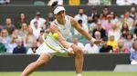 Bianca Andreescu, of Mississauga, Ont., is out of the women's singles draw at Wimbledon after dropping her third-round match to Italy's Jasmine Paolini in straight sets 7-6 (4), 6-1 on Friday. Andreescu returns to Paolini during their third round match at the Wimbledon tennis championships in London, Friday, July 5, 2024. THE CANADIAN PRESS/AP-Kirsty Wigglesworth