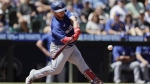 Toronto Blue Jays' Alejandro Kirk hits an RBI double against the Seattle Mariners during the fourth inning in a baseball game, Saturday, July 6, 2024, in Seattle. (AP Photo/John Froschauer)