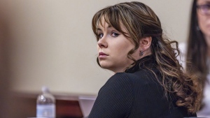 Hannah Gutierrez-Reed, the former armorer for the Western film "Rust," listens to closing arguments in her trial at district court, Wednesday, March 6, 2024, in Santa Fe, N.M.  (Luis Sánchez Saturno/Santa Fe New Mexican via AP, Pool, File)