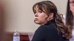 Hannah Gutierrez-Reed, the former armorer for the Western film "Rust," listens to closing arguments in her trial at district court, Wednesday, March 6, 2024, in Santa Fe, N.M. (Luis Sánchez Saturno/Santa Fe New Mexican via AP, Pool, File)