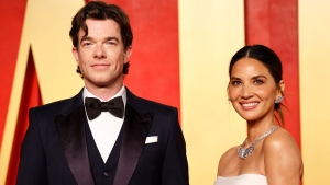 Olivia Munn and John Mulaney attend the Vanity Fair Oscars Party at the Wallis Annenberg Center for the Performing Arts in Beverly Hills, California, on March 10, 2024. (Michael Tran/AFP/Getty Images via CNN Newsource)