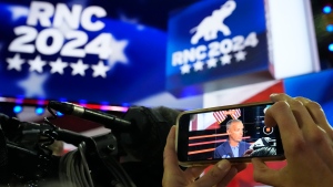 Corey Lewandowski is seen on the screen of a cellphone during a walkthrough at the 2024 Republican National Convention, Sunday, July 14, 2024, in Milwaukee. (AP Photo/Nam Y. Huh)