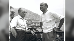 This image released by Cohen Media Group shows Emeric Pressburger, left, and Michael Powell on the set of "The Red Shoes." (Cohen Media Group via AP)