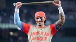 American League's Jarren Duran, of the Boston Red Sox, holds the award for the most valuable player after the MLB All-Star baseball game, Tuesday, July 16, 2024, in Arlington, Texas. (AP Photo/Julio Cortez)