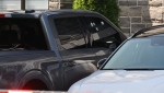 A bullet-riddled truck is seen outside a Brampton home on July 17.