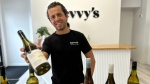 Cristian Villamarin, owner of Bevvy's, shows off some of his wares at the non-alcoholic bottle shop in Kensington Market Thursday July 11, 2024. (Joshua Freeman /CP24)