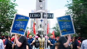 LCBO Workers and supporters hold a strike rally at a picket line in front of an LCBO store, in Toronto on Saturday, July 6, 2024. THE CANADIAN PRESS/Christopher Katsarov