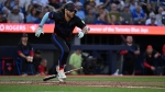 Toronto Blue Jays shortstop Bo Bichette (11) runs out a single against the Detroit Tigers during fifth inning American League baseball action in Toronto on Friday, July 19, 2024. THE CANADIAN PRESS/Jon Blacker
