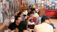 Customers have lunch at Katz's Delicatessen on Sept. 30, 2020 in New York. (AP Photo/Mary Altaffer, File)