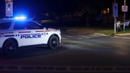 A Durham Regional Police cruiser is pictured above at the scene of a deadly crash in Bowmanville on July 21, 2024.