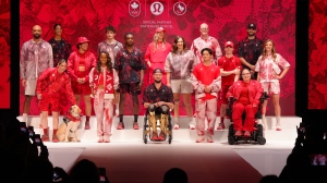 Athletes show the collection during the unveiling of the Team Canada Lululemon Athlete Kit for the Paris 2024 Olympic and Paralympic Games in Toronto on Tuesday, April 16, 2024.THE CANADIAN PRESS/Chris Young