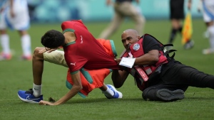 Fans rush on field