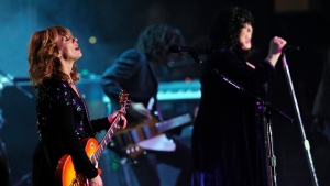 Nancy Wilson, left, and her sister Ann Wilson of the band Heart perform in Los Angeles, Friday, May 7, 2010. (AP Photo/Chris Pizzello)